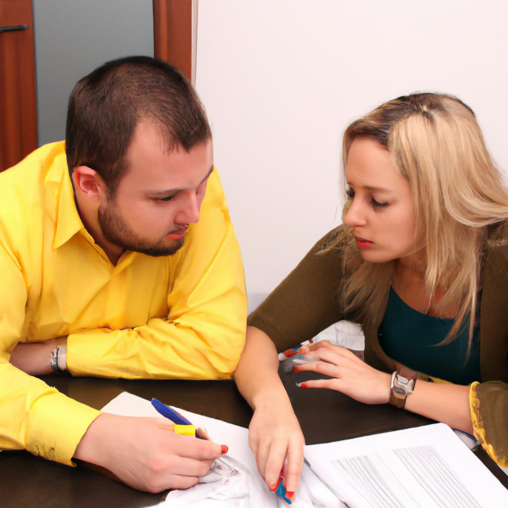 Couple discussing financial documents together